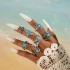 Cross border European and American new retro ethnic style inlaid turquoise carved feather ring set, fashionable and personalized ring for women