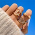 Amazon's new personalized accessory set featuring European and American fashion, cross shaped spiral geometric gold opening ring, three piece set