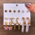 European and American Cross border Retro Love Butterfly Earring Set 9-piece Creative Serpentine Sword Mushroom Ear Buckle Wholesale