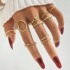 Cross border hot selling diamond studded eye cross leaf ring multi joint 23 piece set pearl sun moon ring