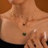 Cross border imitation grandmother emerald temperament versatile multi-layer bow necklace light luxury diamond inlaid love flower necklace