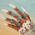 Cross border European and American new retro ethnic style inlaid turquoise carved feather ring set, fashionable and personalized ring for women