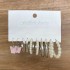 Cross border alloy heart pearl lock snake butterfly mushroom lock ear buckle creative personality card earrings 12 pieces batch