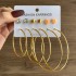 Fashionable commuting large circle earrings with heart-shaped earrings, simple geometric coils, metal card earrings set