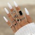 New European and American retro black gemstone inlaid nine piece ring set, geometric snake shaped crown leaf ring set