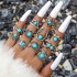 Cross border European and American new retro ethnic style inlaid turquoise carved feather ring set, fashionable and personalized ring for women