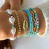 Cross border new Bohemian vacation style shell bead woven bracelet beach style starfish rice bead seven piece set