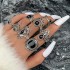 New European and American retro black gemstone inlaid nine piece ring set, geometric snake shaped crown leaf ring set