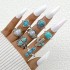 Cross border European and American new retro ethnic style inlaid turquoise carved feather ring set, fashionable and personalized ring for women