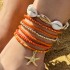 Cross border new Bohemian vacation style shell bead woven bracelet beach style starfish rice bead seven piece set