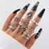 European and American punk dark butterfly skull hollow face ring multi piece set, personalized and trendy vintage ring set