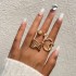 Amazon's new personalized accessory set featuring European and American fashion, cross shaped spiral geometric gold opening ring, three piece set