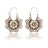 European and American foreign trade jewelry retro ethnic style metal hollow flower earrings Bohemian carved flower earrings