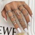 Cross border hot selling diamond studded eye cross leaf ring multi joint 23 piece set pearl sun moon ring