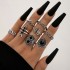 New European and American retro black gemstone inlaid nine piece ring set, geometric snake shaped crown leaf ring set