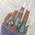 Cross border European and American new retro ethnic style inlaid turquoise carved feather ring set, fashionable and personalized ring for women