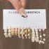 Cross border alloy heart pearl lock snake butterfly mushroom lock ear buckle creative personality card earrings 12 pieces batch