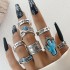 Cross border European and American new retro ethnic style inlaid turquoise carved feather ring set, fashionable and personalized ring for women