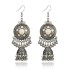 European and American foreign trade jewelry retro ethnic style metal hollow flower earrings Bohemian carved flower earrings