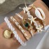 Cross border new Bohemian vacation style shell bead woven bracelet beach style starfish rice bead seven piece set