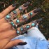 Cross border European and American new retro ethnic style inlaid turquoise carved feather ring set, fashionable and personalized ring for women