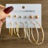 Fashionable commuting large circle earrings with heart-shaped earrings, simple geometric coils, metal card earrings set