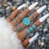 European and American cross-border popular jewelry retro ethnic style turquoise elephant geometric graphic 7-piece set silver ring set