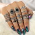 Cross border jewelry 15 piece set of personalized trendy hollow lotus sunflower geometric black gemstone set of rings