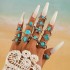 Cross border European and American new retro ethnic style inlaid turquoise carved feather ring set, fashionable and personalized ring for women