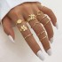 Cross border hot selling diamond studded eye cross leaf ring multi joint 23 piece set pearl sun moon ring