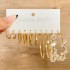 Cross border alloy heart pearl lock snake butterfly mushroom lock ear buckle creative personality card earrings 12 pieces batch