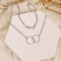 Cross border European and American retro circular antique bronze bead multi-layer geometric hexagonal circle arrow necklace in the Korean jewelry industry