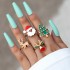 New Christmas Oil Drop Ring Set for Cross border Festivals in Europe and America, Four piece Elk Geometric Alloy Ring Set