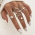 Cross border hot selling diamond studded eye cross leaf ring multi joint 23 piece set pearl sun moon ring