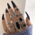 New European and American retro black gemstone inlaid nine piece ring set, geometric snake shaped crown leaf ring set