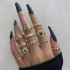 Cross border retro, personalized, fashionable metal imitation emerald, diamond studded heart-shaped snake shaped ring, multi piece set for women in Europe and America