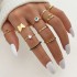 Cross border hot selling diamond studded eye cross leaf ring multi joint 23 piece set pearl sun moon ring