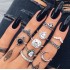 New European and American retro black gemstone inlaid nine piece ring set, geometric snake shaped crown leaf ring set