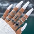 New European and American retro black gemstone inlaid nine piece ring set, geometric snake shaped crown leaf ring set