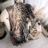 2024 European and American new leopard print scarf, thickened and warm, fashionable for autumn and winter, worn as a shawl, double-sided imitation cashmere dual-use