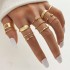 Cross border hot selling diamond studded eye cross leaf ring multi joint 23 piece set pearl sun moon ring