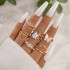 Cross border retro, personalized, fashionable metal imitation emerald, diamond studded heart-shaped snake shaped ring, multi piece set for women in Europe and America