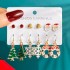 Christmas Series Snowflake Bell Earnail Combination Set Cross border Cartoon Drip Oil Elk Old Man Christmas Earrings