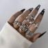 European and American punk dark butterfly skull hollow face ring multi piece set, personalized and trendy vintage ring set