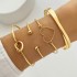 European and American cross-border alloy heart knot bracelet set creative peach heart heart geometric cross bracelet 4-piece set batch