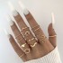 AliExpress new light luxury simple cross inlaid diamond multi piece ring set, personalized heart hollow out ten piece ring set