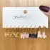 Cross border alloy heart pearl lock snake butterfly mushroom lock ear buckle creative personality card earrings 12 pieces batch