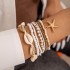 Cross border new Bohemian vacation style shell bead woven bracelet beach style starfish rice bead seven piece set