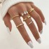 Cross border hot selling diamond studded eye cross leaf ring multi joint 23 piece set pearl sun moon ring