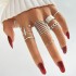 Cross border hot selling diamond studded eye cross leaf ring multi joint 23 piece set pearl sun moon ring